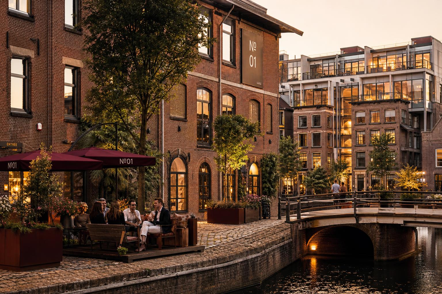 Canal-side mixed-use buildings in the Netherlands at golden hour, with an outdoor terrace and people gathering